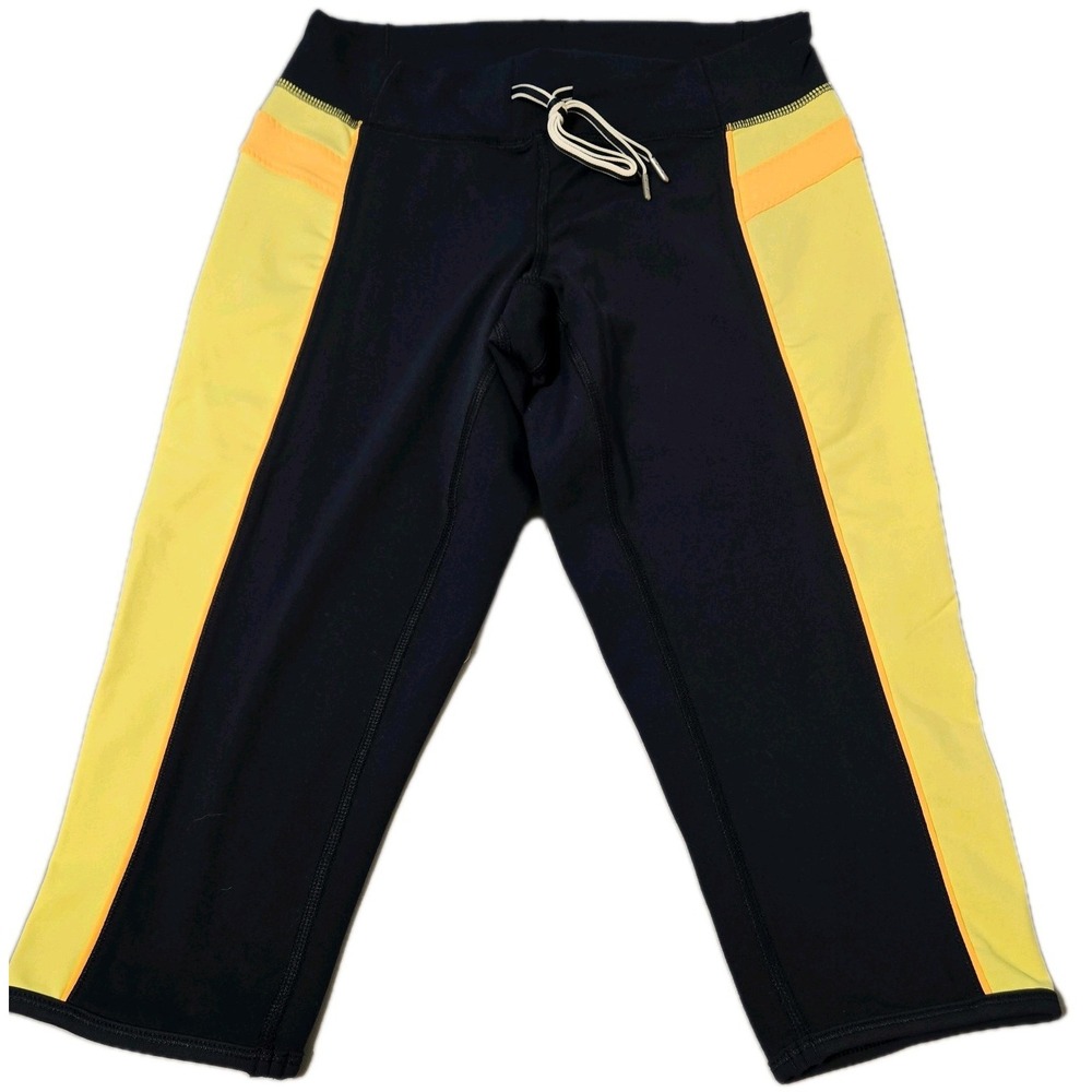 Lululemon Heat It Up Crop Leggings Mellow Lemon/Navy Drawstring Size 6 NWOT